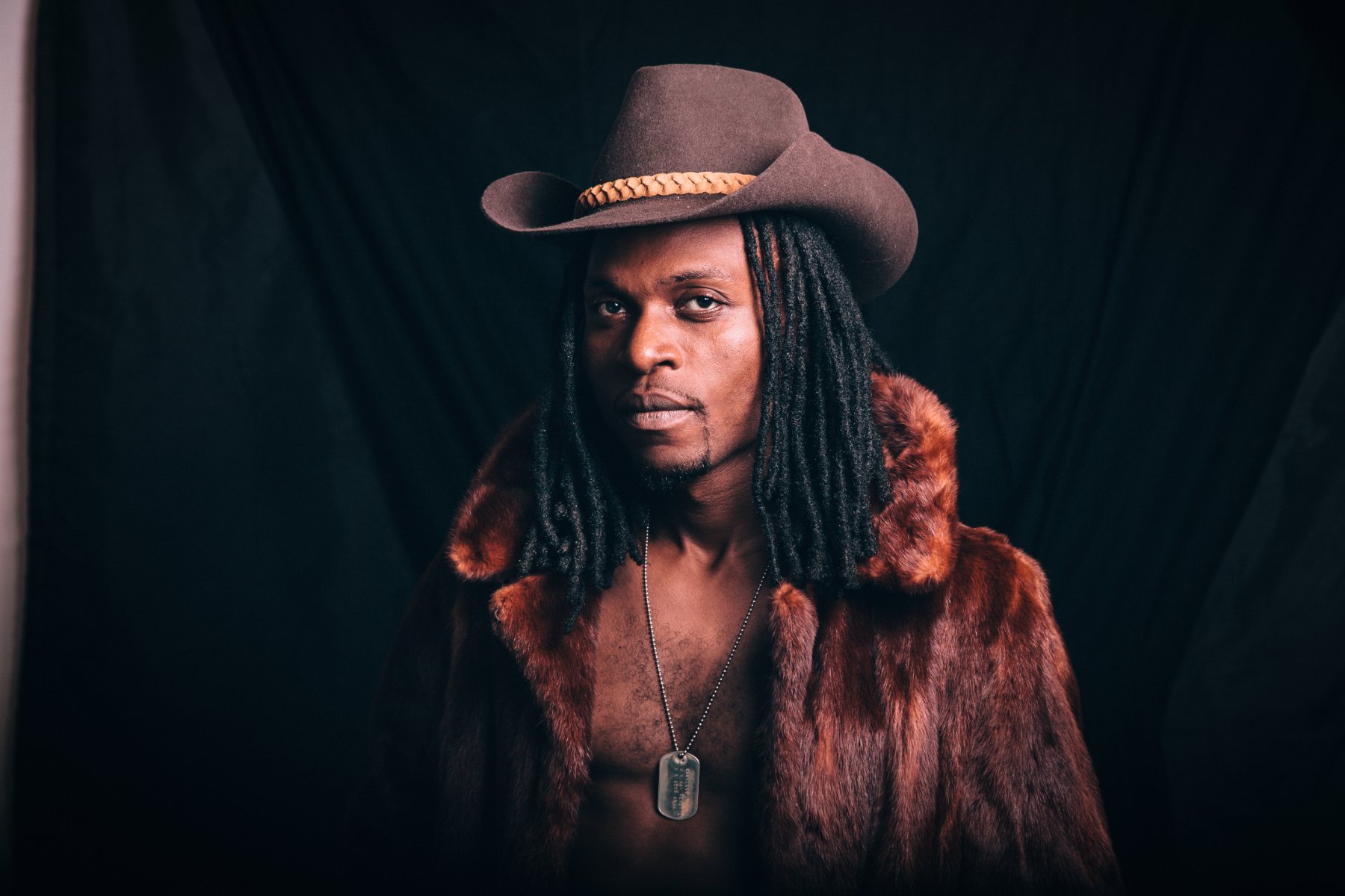 Congo Cowboys frontman, dramatic studio portrait
